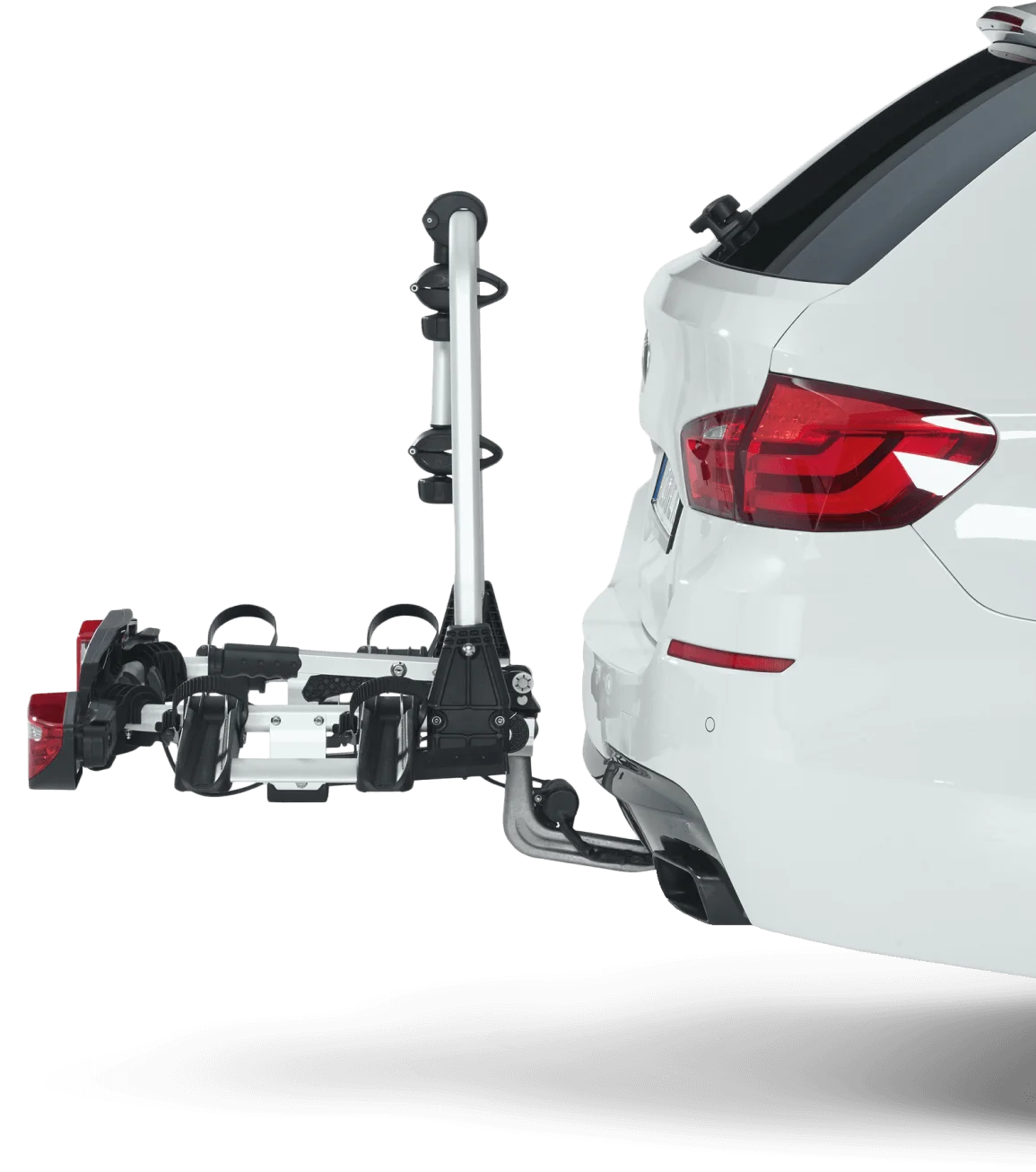 Uebler-fietsdrager op de trekhaak van een witte auto